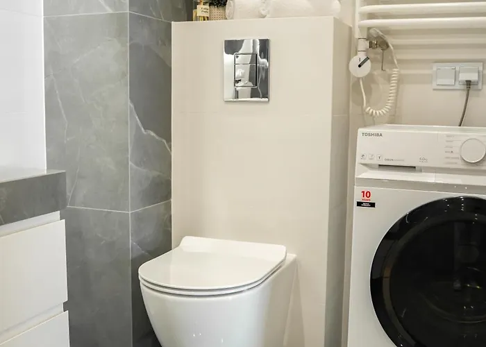 K&m Tauron Arena, Lema Apartamento